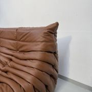 Three-seater Togo sofa in dark cognac leather by Michel Ducaroy for Ligne Roset.
