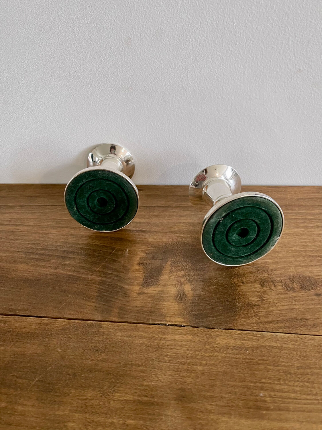 Pair of silver metal candle holders