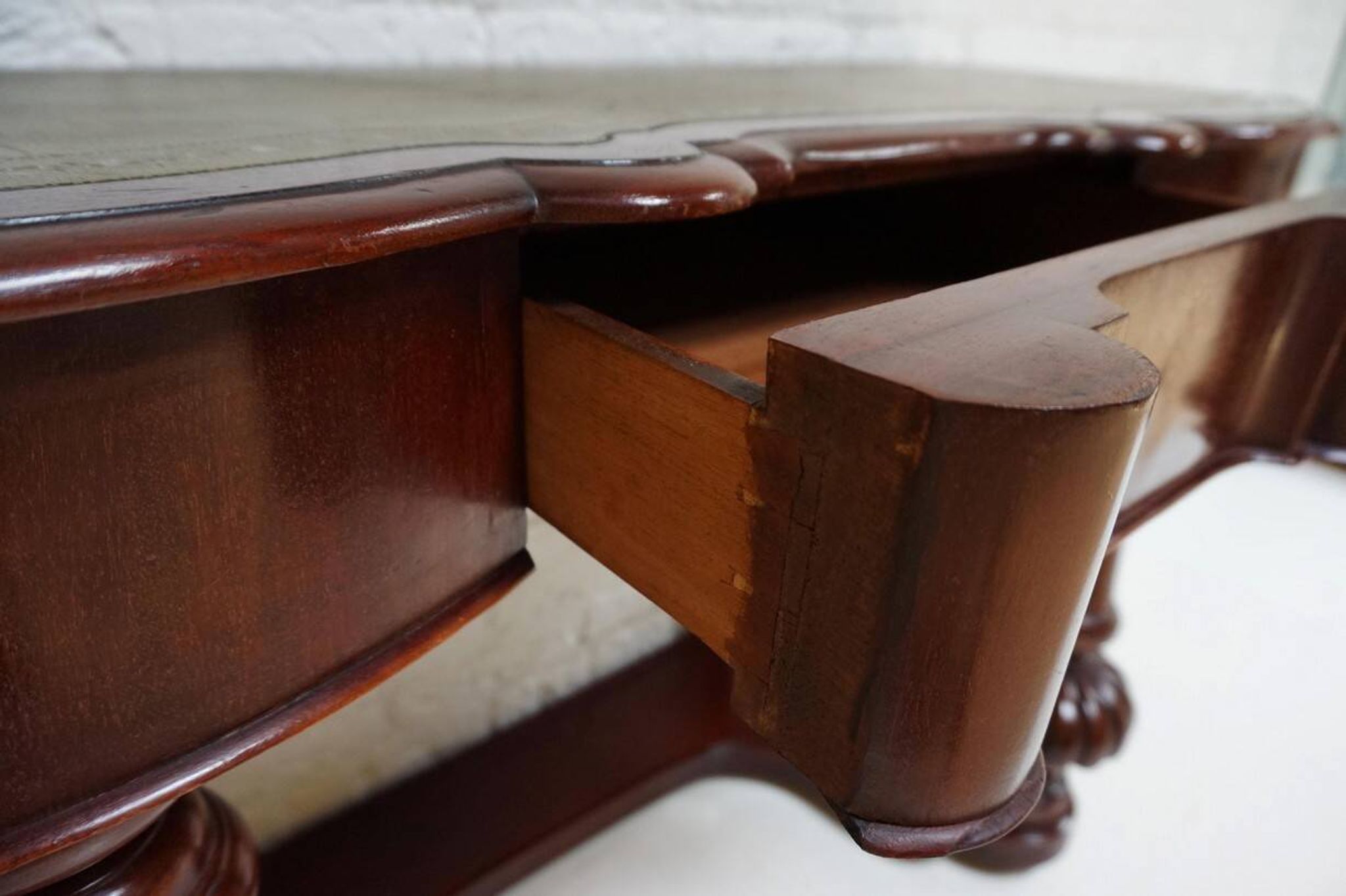 Mahogany and green leather console, 1860-70