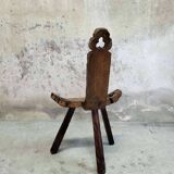 Brutalist tripod low chair