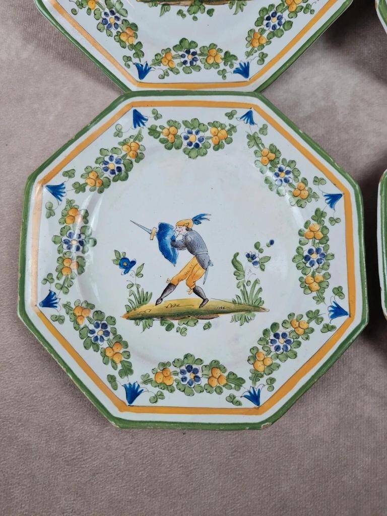 Set of 12 small antique plates by Alfred Renoleau, different designs.