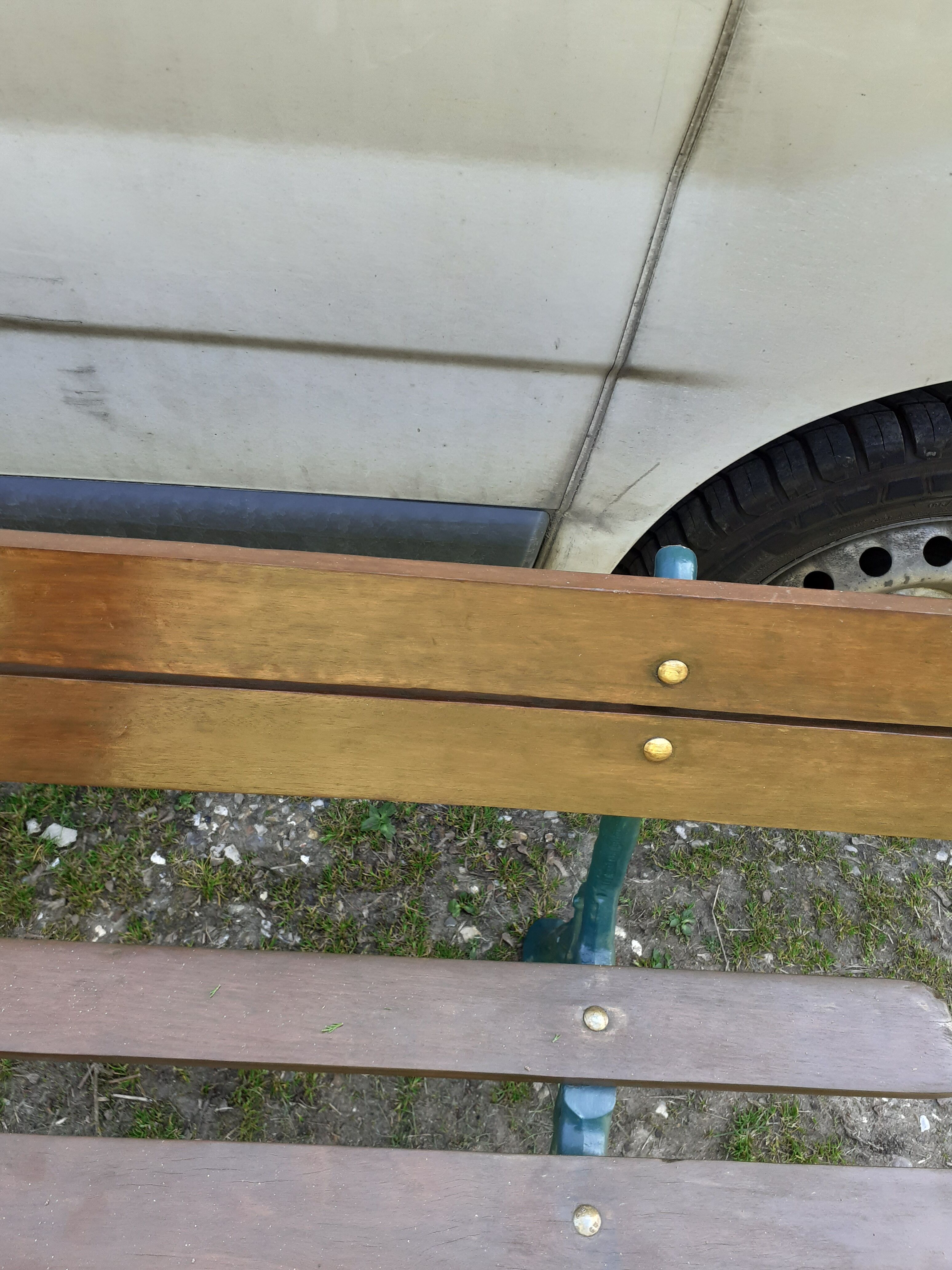 Old garden bench with cast iron feet
