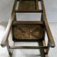 Armchair in carved solid wood with straw seat