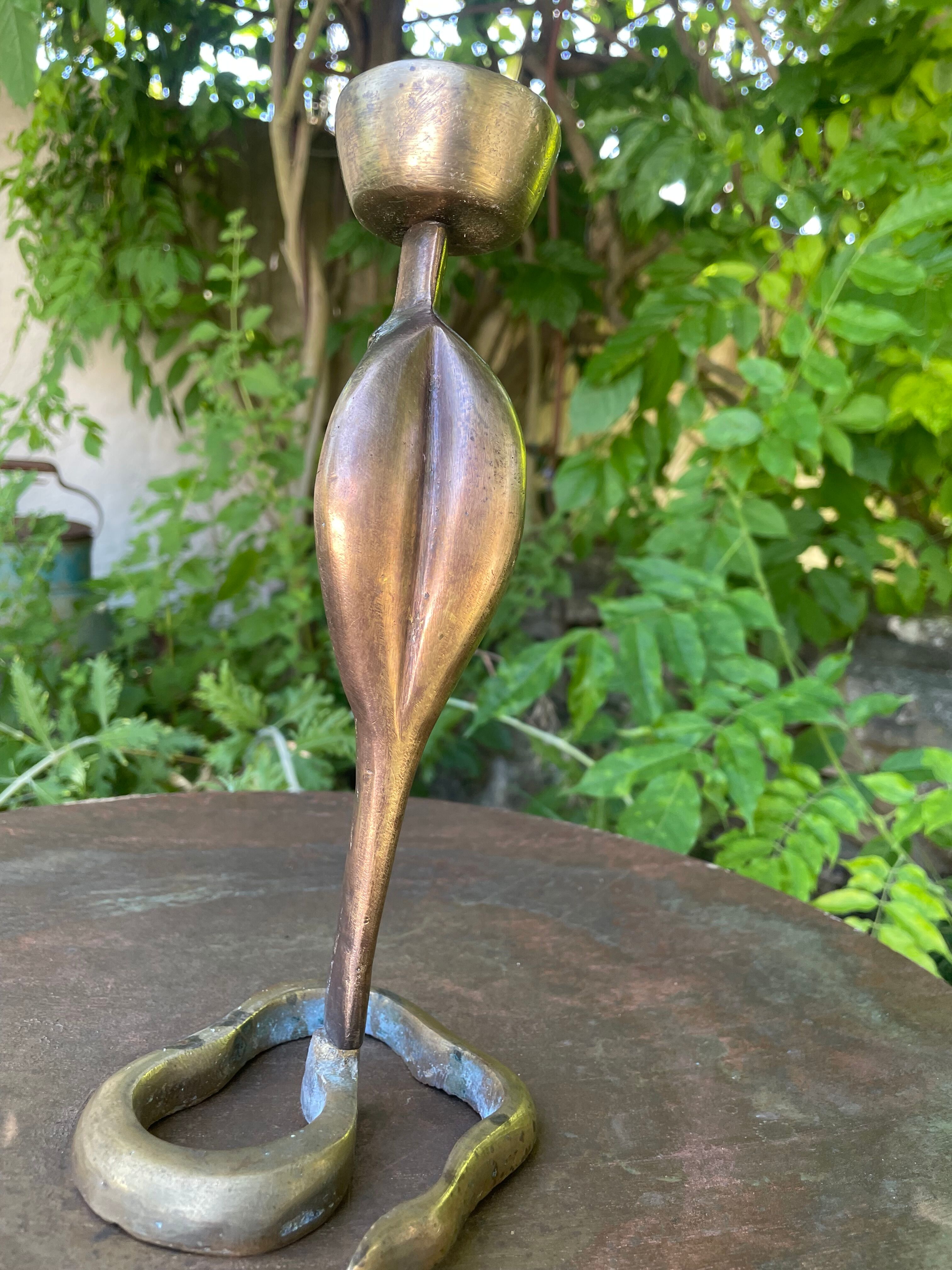 Cobra candlestick in Latvian