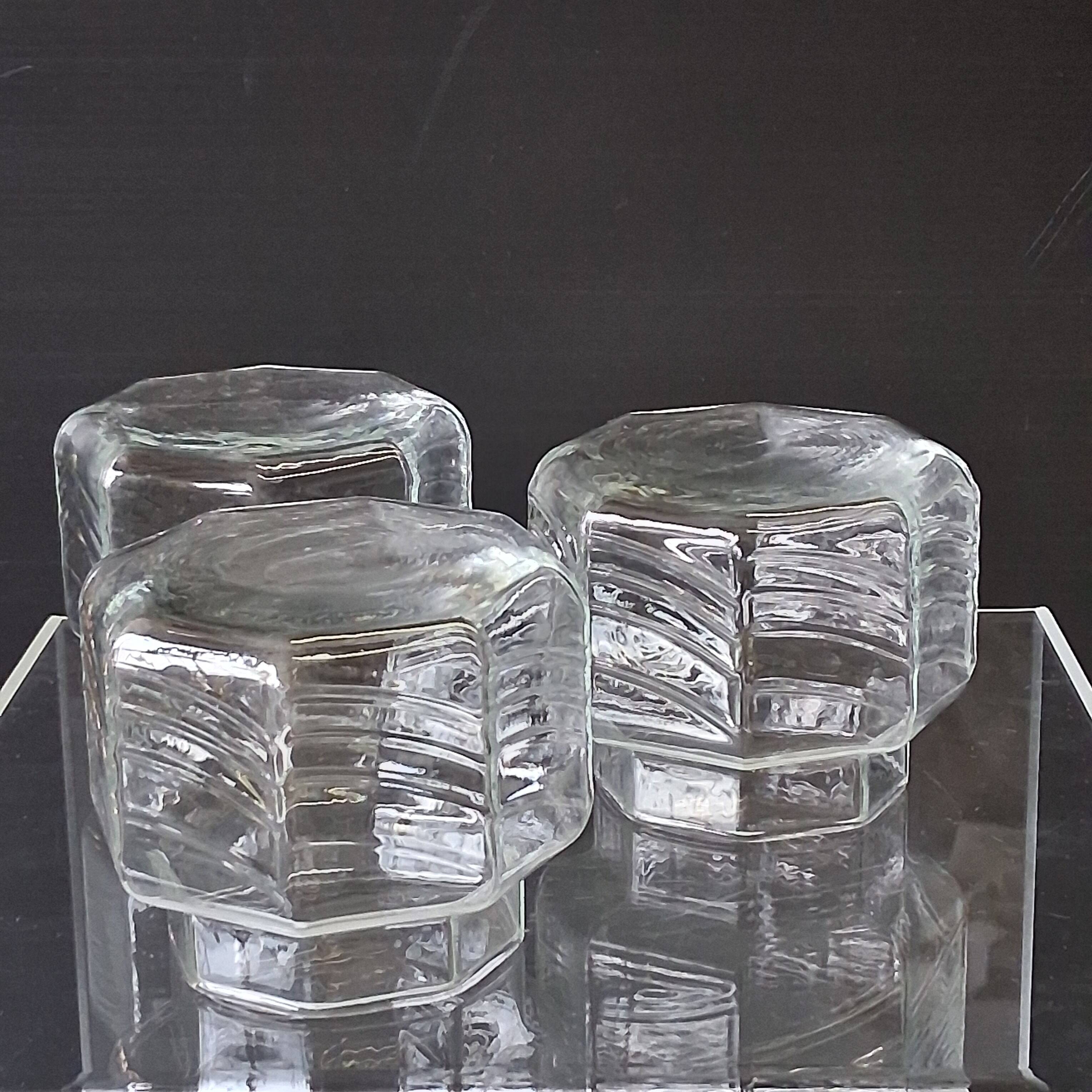 Set of 3 glass jars with old transparent lids in very good condition.