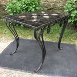 Vintage ceramic coffee table by Guy Trévoux with wrought iron base.