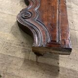 Cornice pediment in low relief in wood