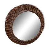 Round mirror in dark rattan