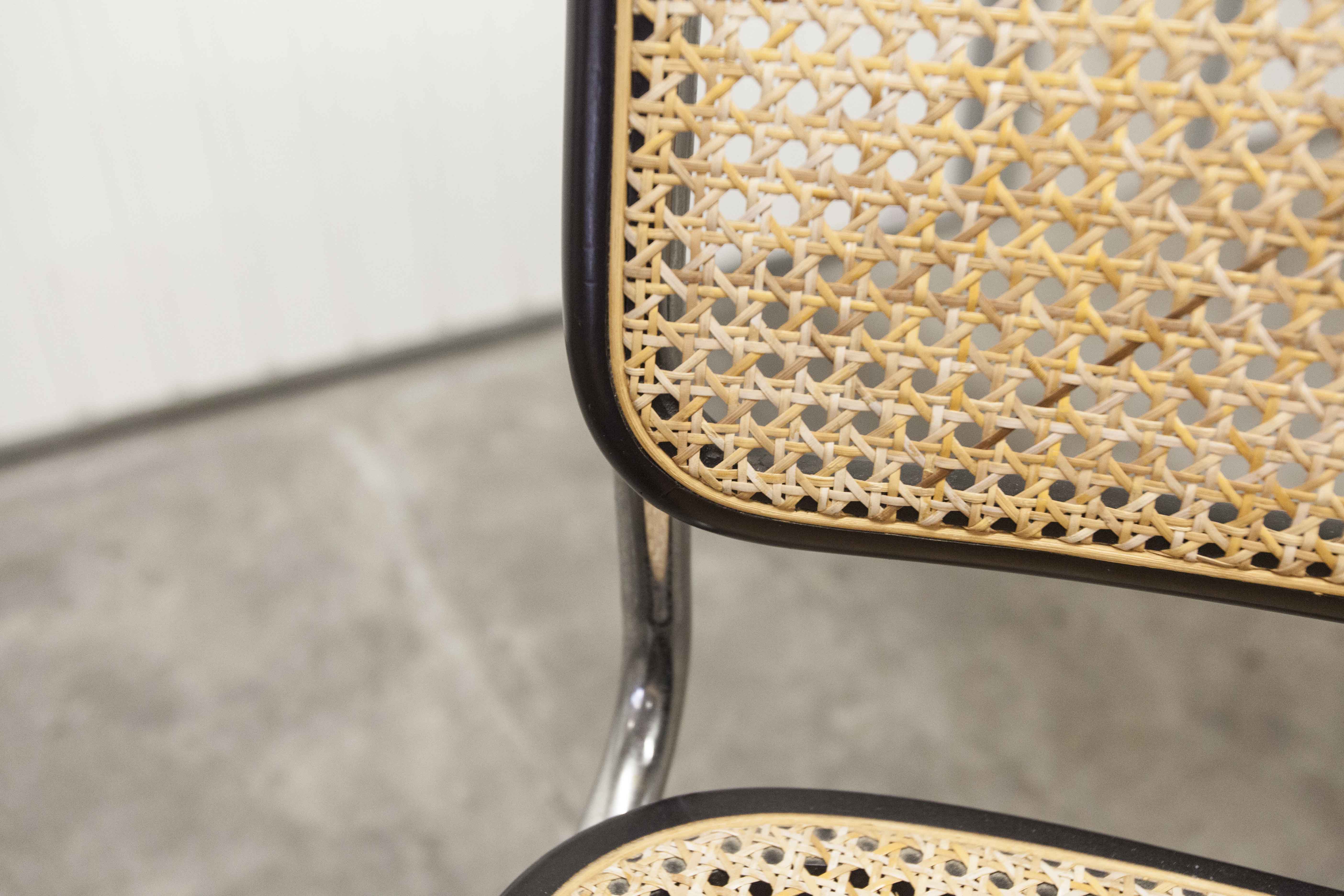 Pair of black Breuer b32 chairs and cannage