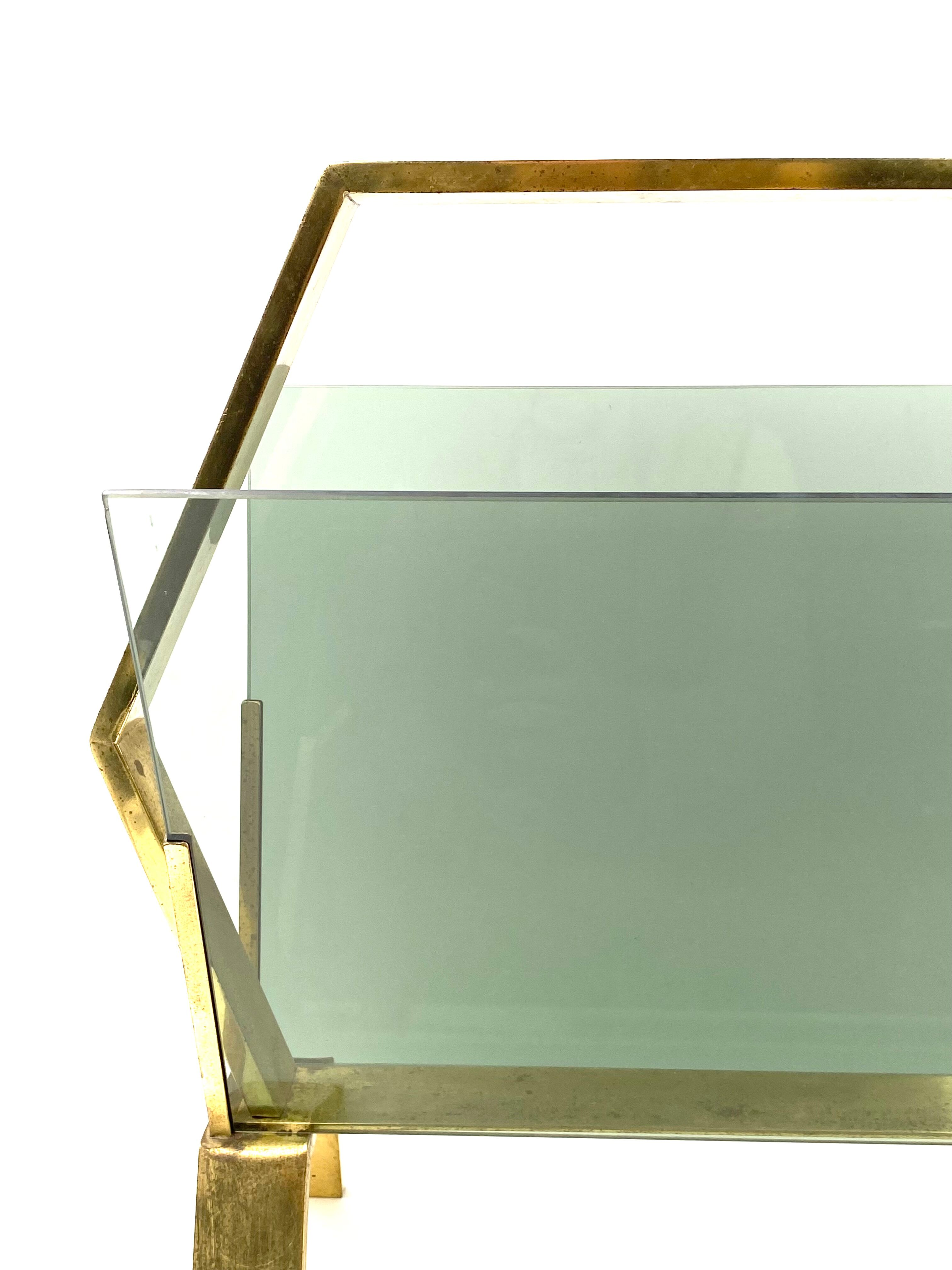 Modern brass magazine rack,  Italy 1970