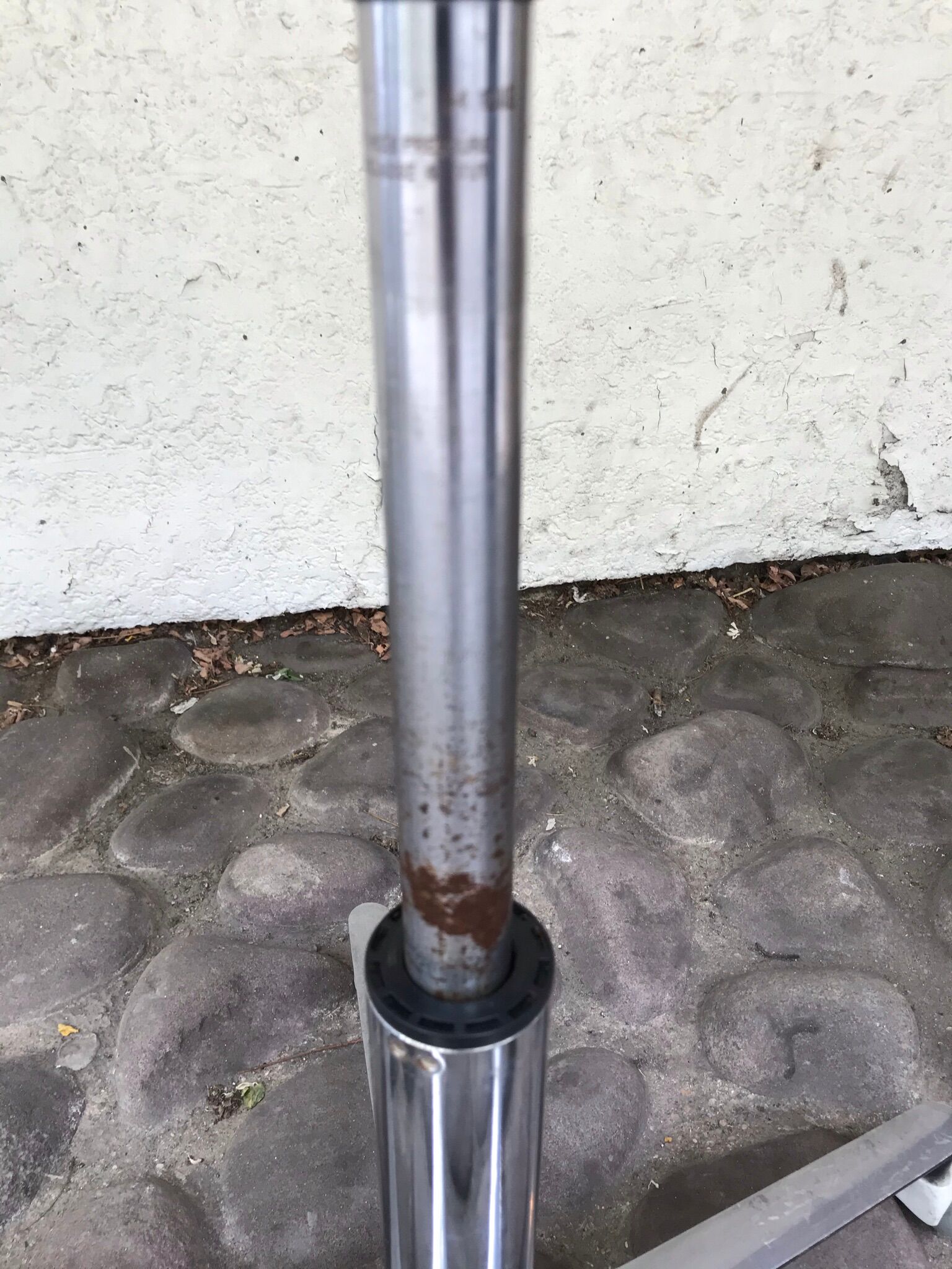 Stool on metal stand in star on wheels sitting round padded skaï bluish