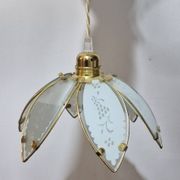 Glass flower rimmed with brass