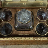 Liquor cellar in false pretence of stacked bound books