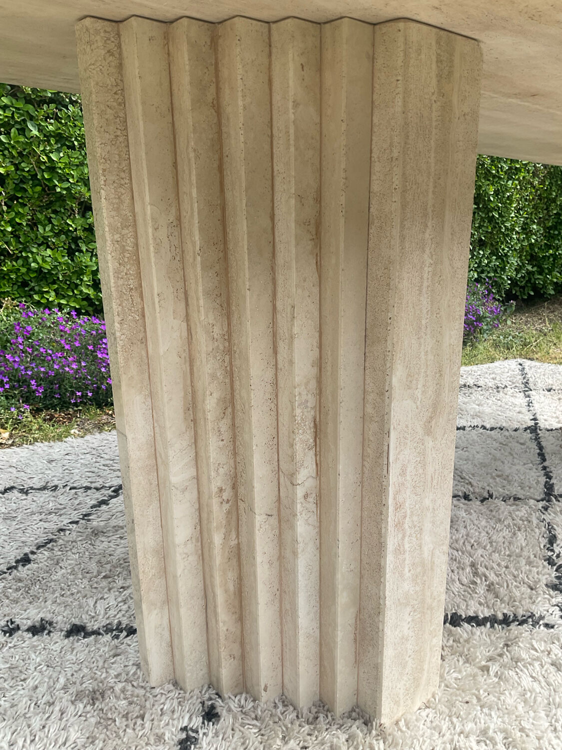 Large vintage dining table in travertine in the 1970s Carpa style.