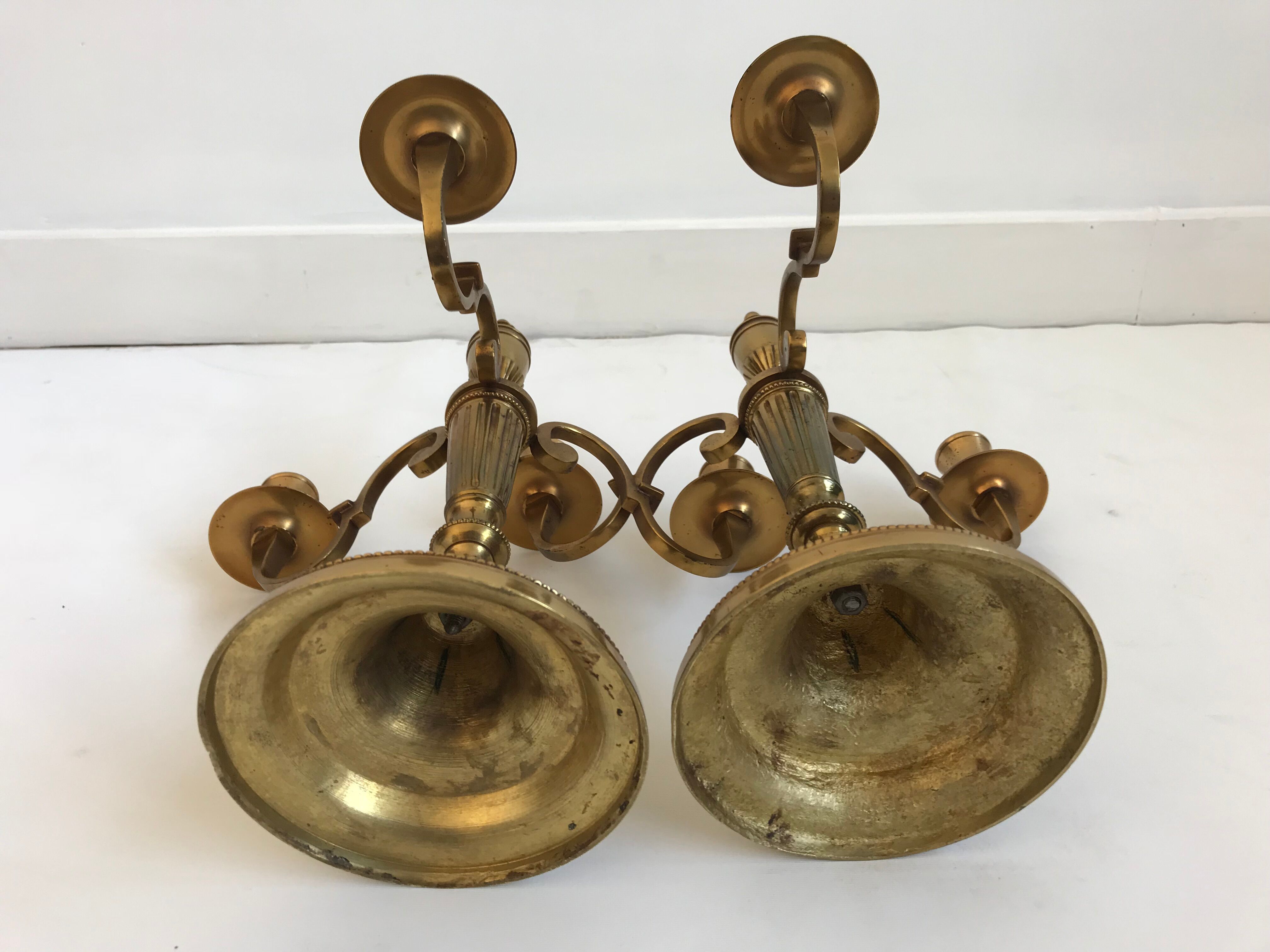 Pair of golden brass candlesticks