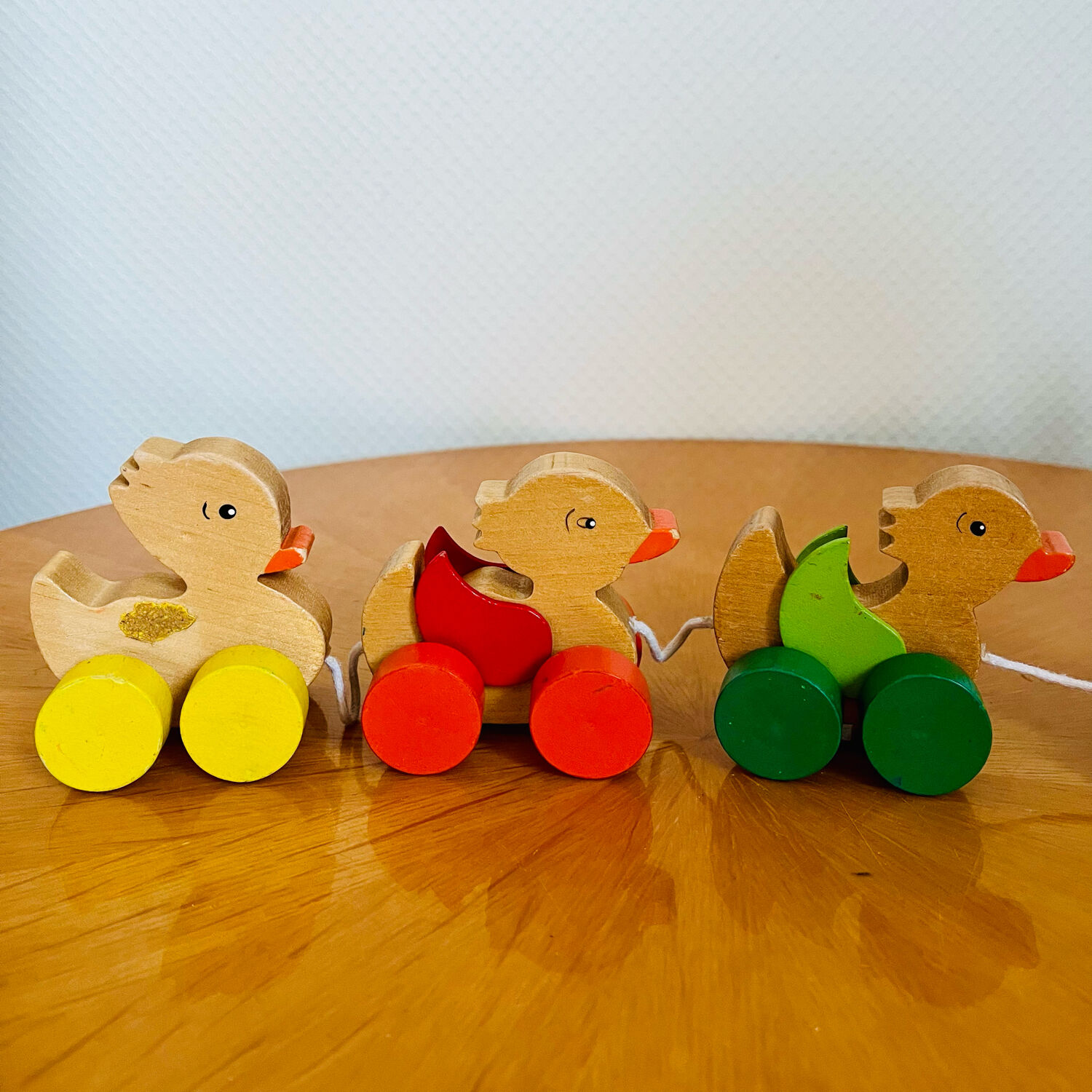Old vintage wooden duck toy to pull