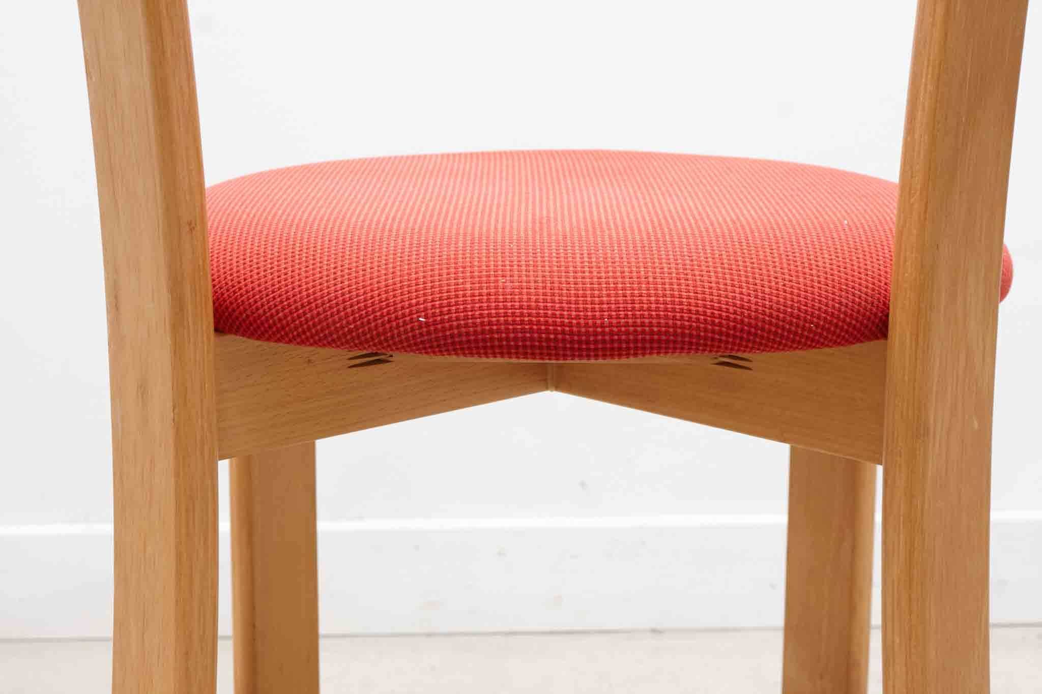 Horn chair upholstered in red and beech