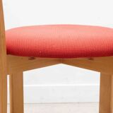 Chair upholstered in red and beech