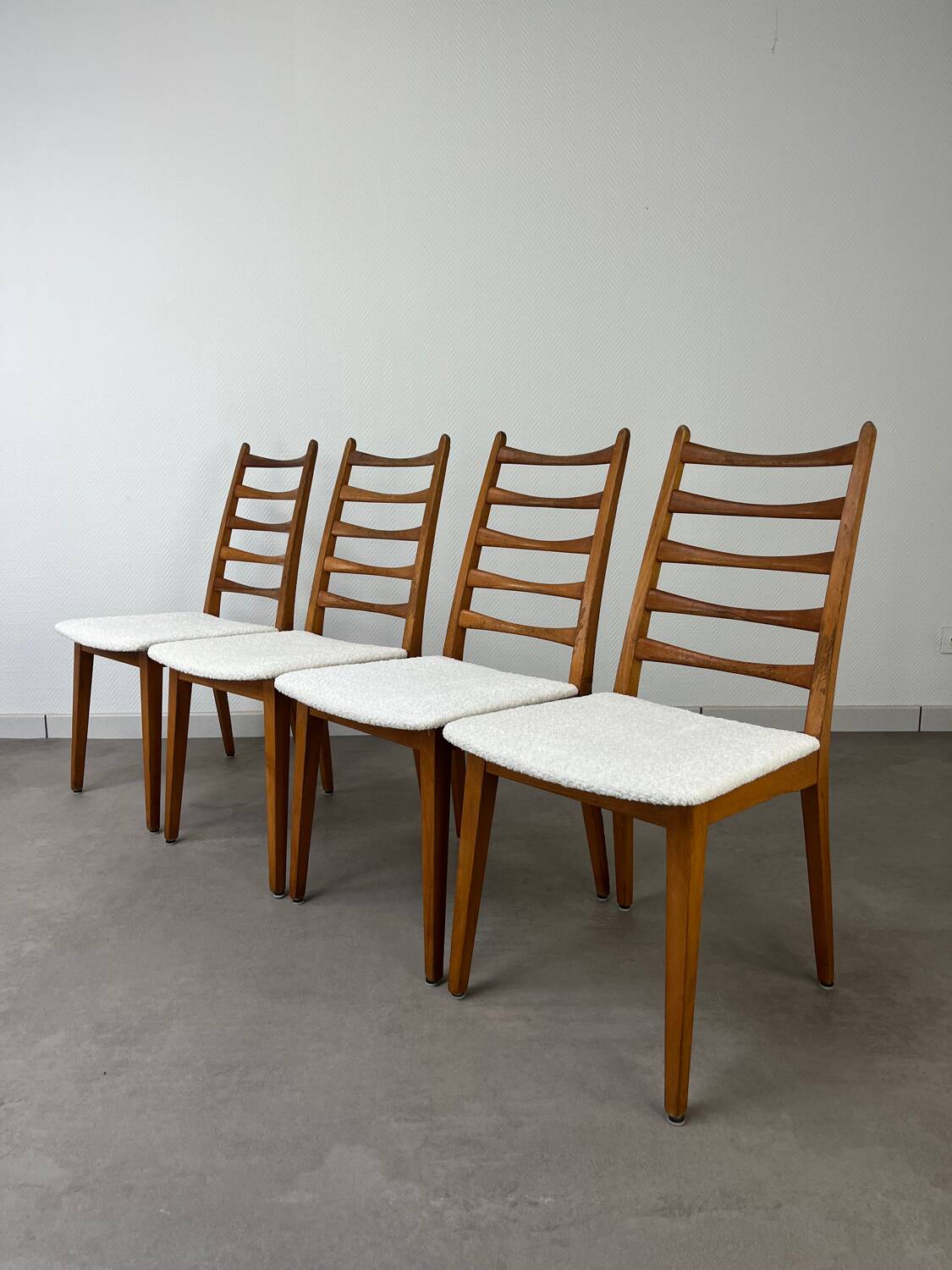 4 Scandinavian chairs, teak with boucle seats.