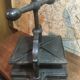 Cast iron binding press