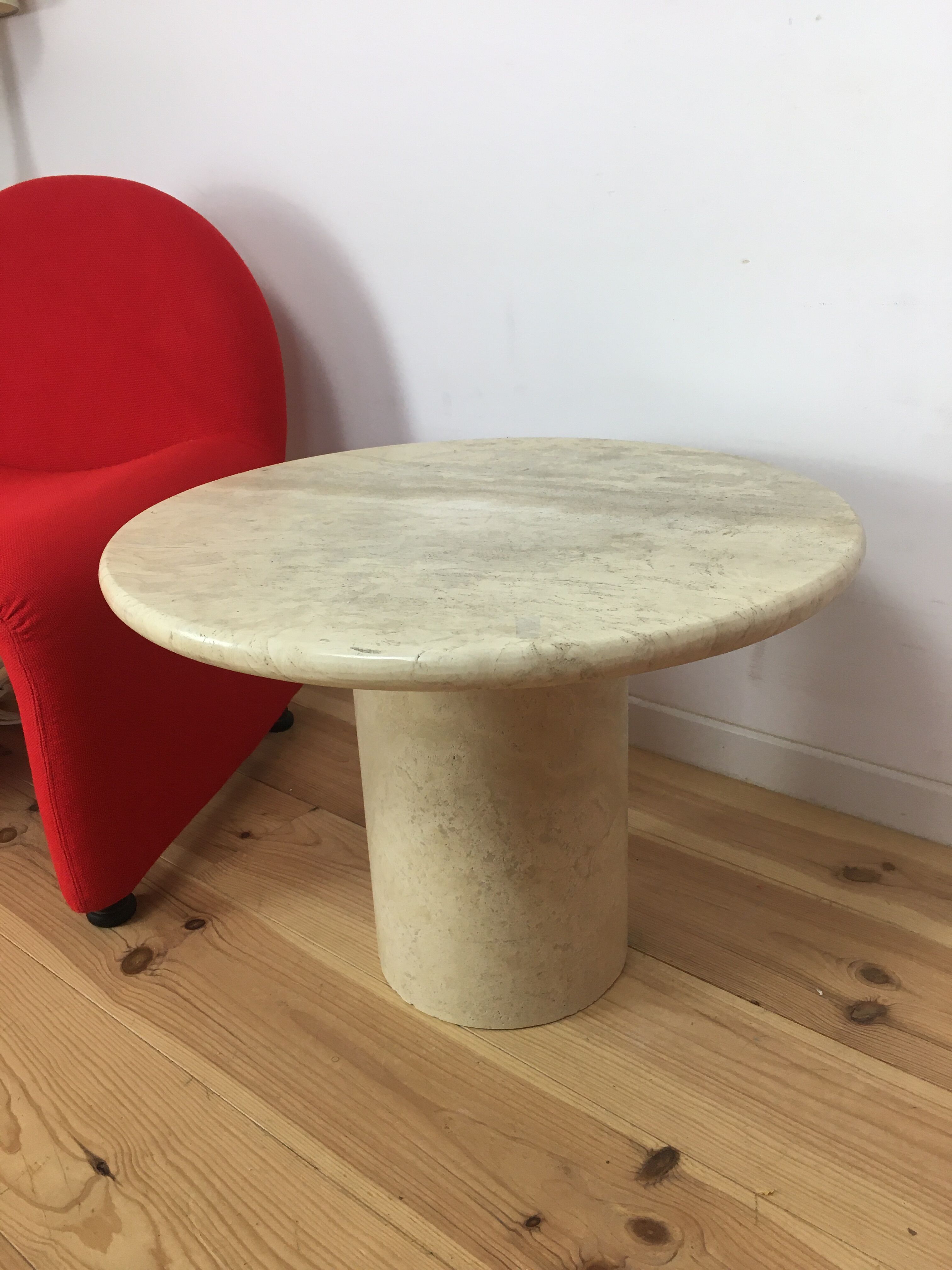Round travertine coffee table