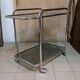 Dessert bar with chromed metal and smoked glass wheels, 70s