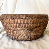 Old bread pan, in woven straw