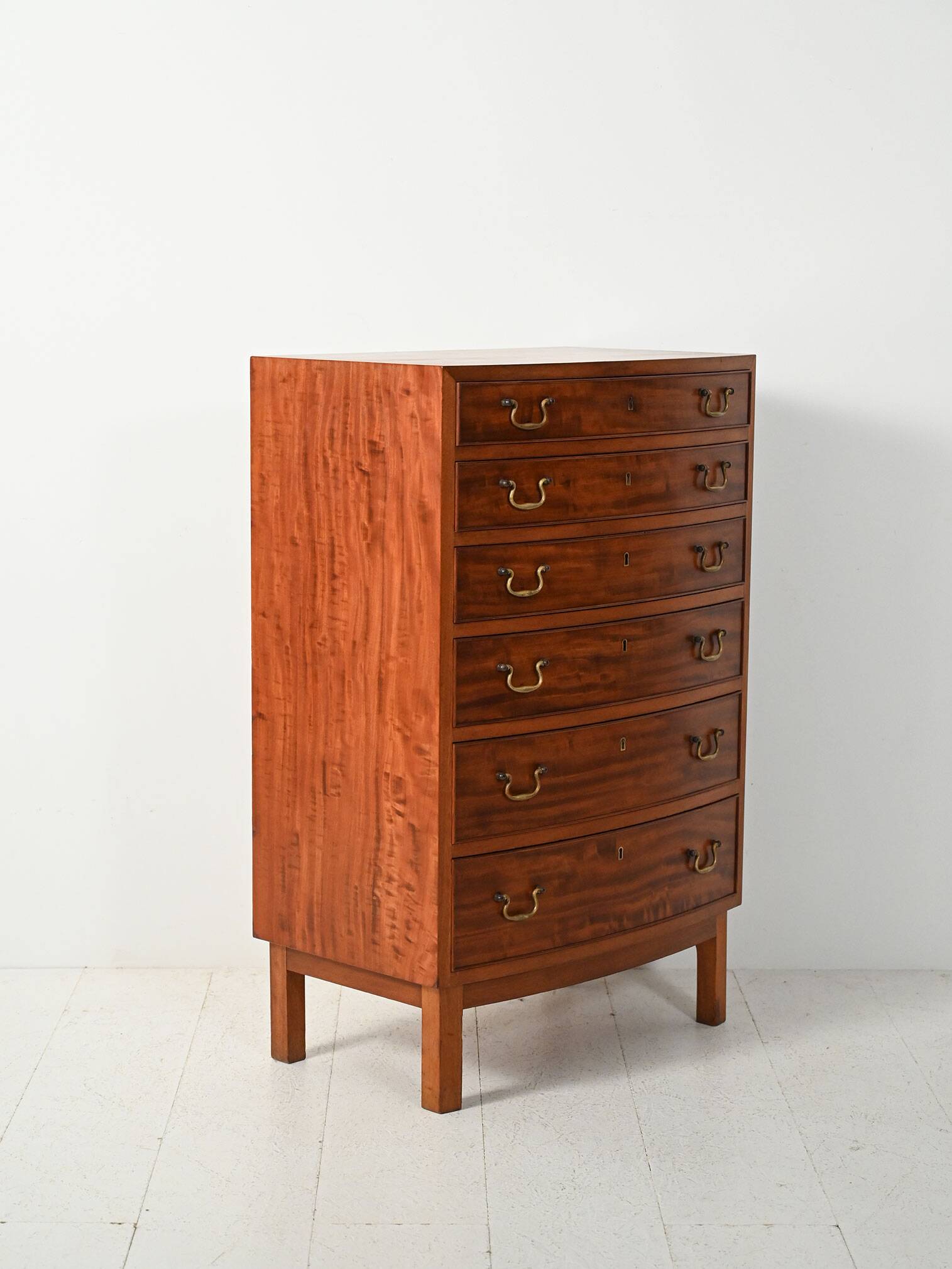 Scandinavian mahogany tallboy with brass handles