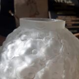 Round vase in opaque molded white glass patterns flowers