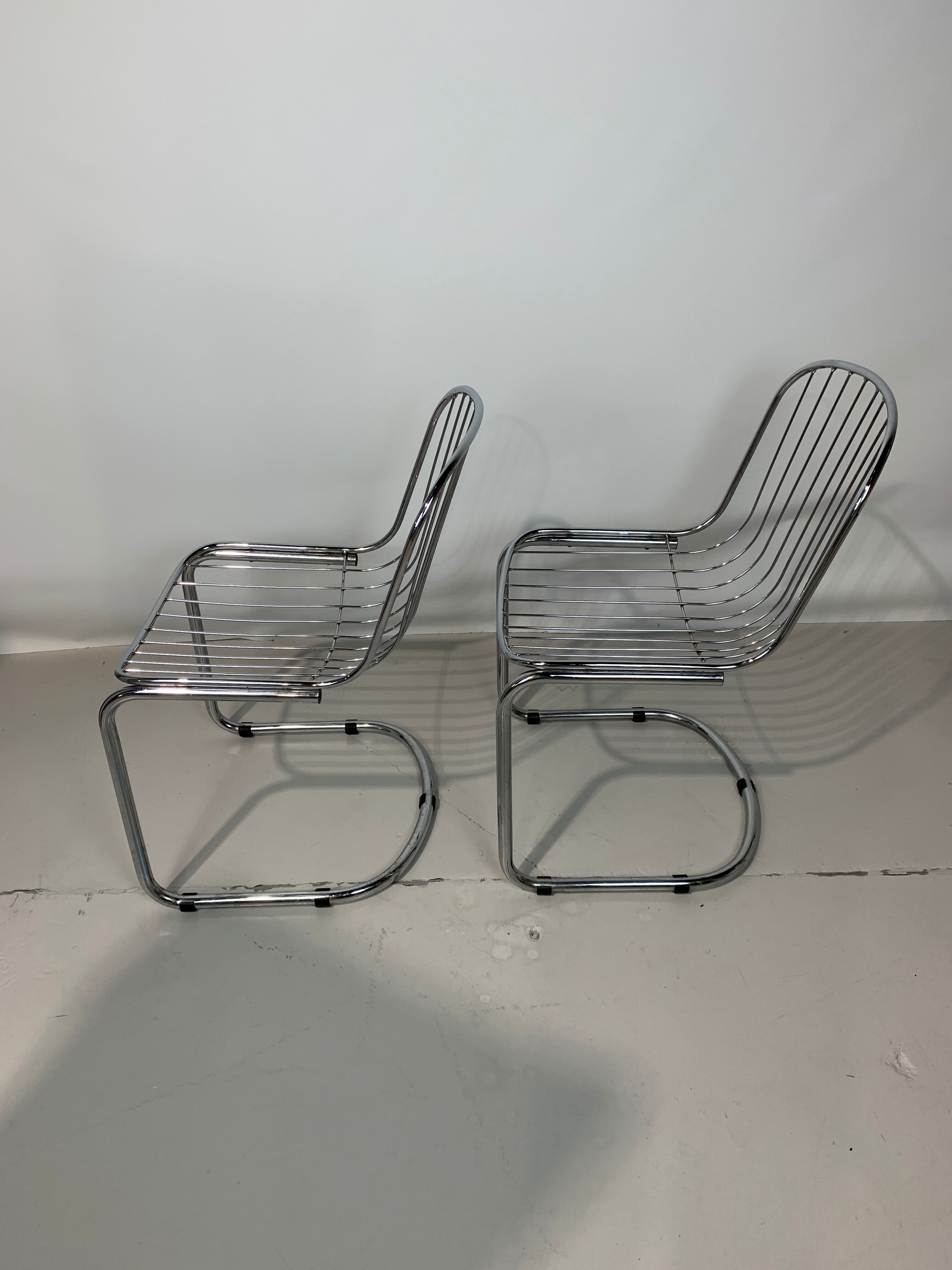 Pair of chairs by Gastone Rinaldi