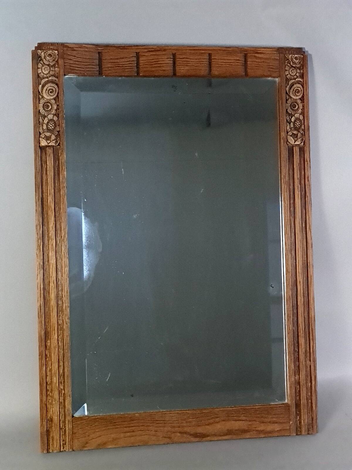 Miroir biseauté Art déco en chêne et stuc