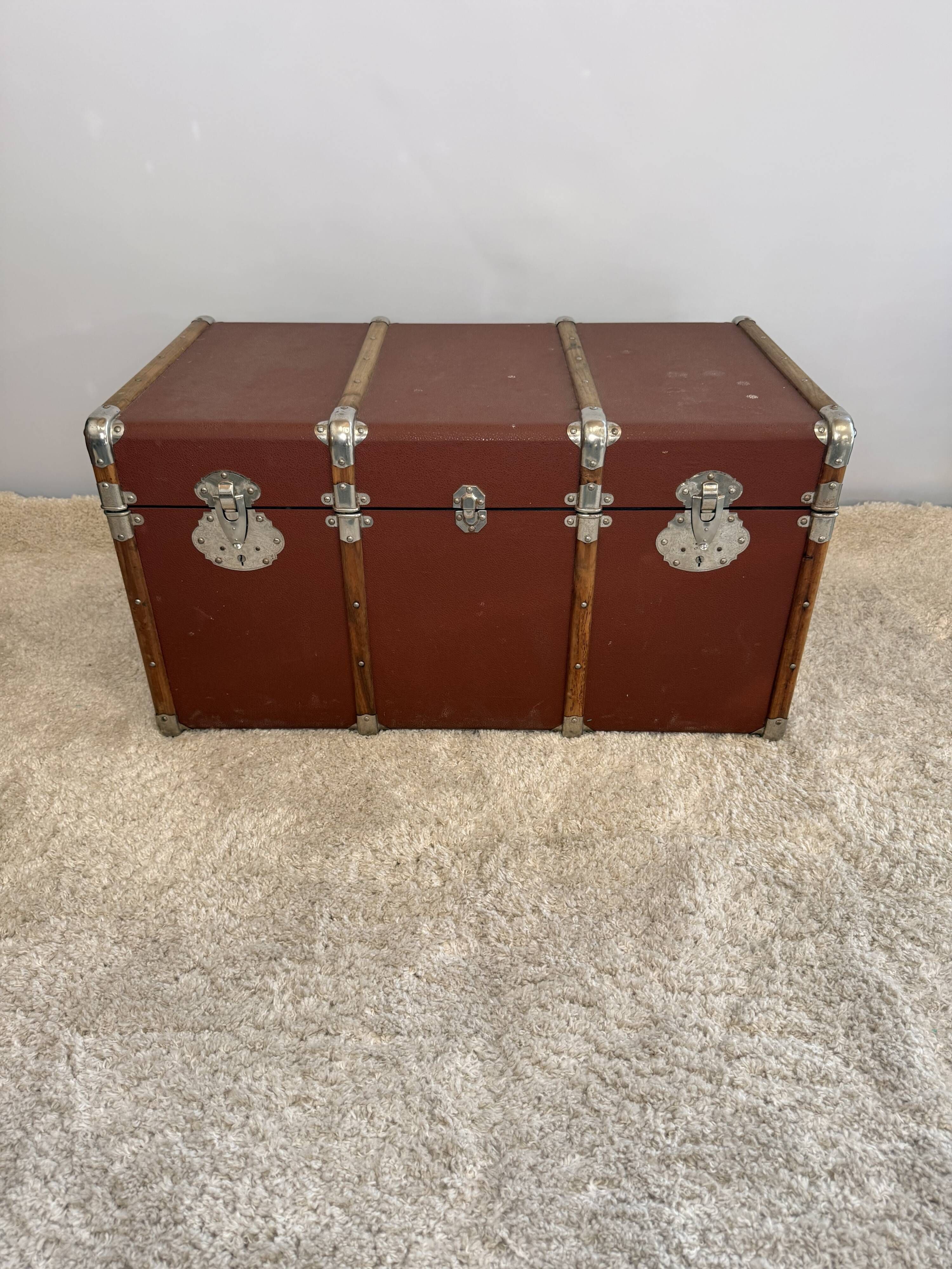 Vintage wooden and metal travel trunk