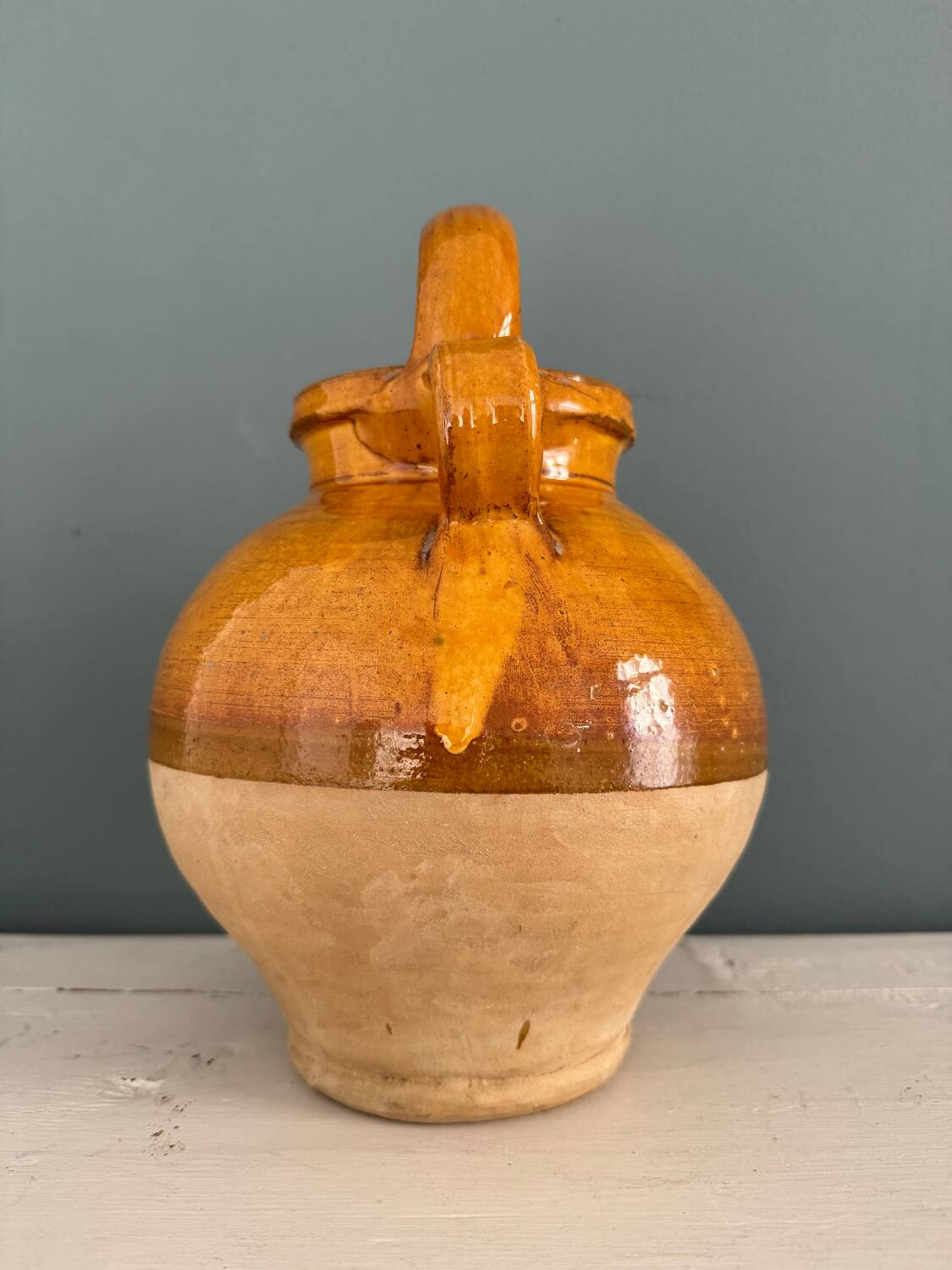 Old terracotta gargoulette jug