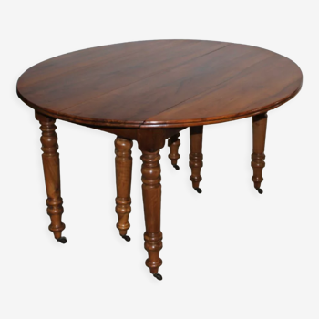 Louis Philippe six-legged table in walnut XIX