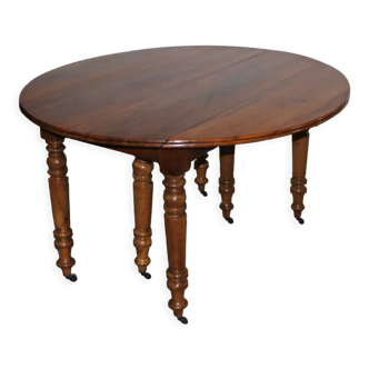 Louis Philippe six-legged table in walnut XIX