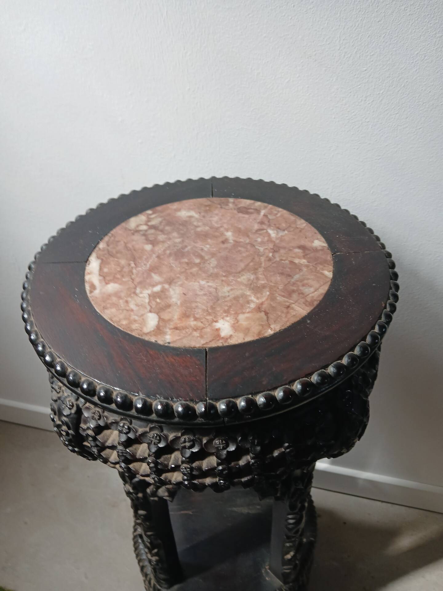 Antique Japanese stand or side table from the late 19th century.
