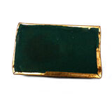 Metal and colored stone pocket emptier