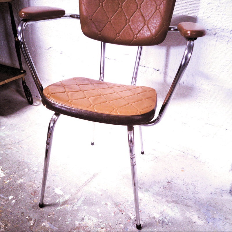 Vintage armchair in skai