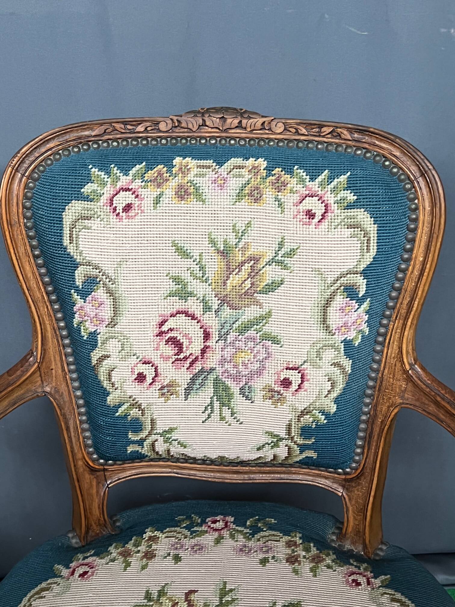 Pair of hand-embroidered armchairs. Walnut.