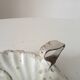 Antique hand candle holder "cellar rat" in enamelled metal