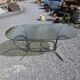 Silver metal table with smoked glass top from the 1970s.