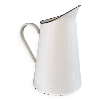 Old white enameled pitcher