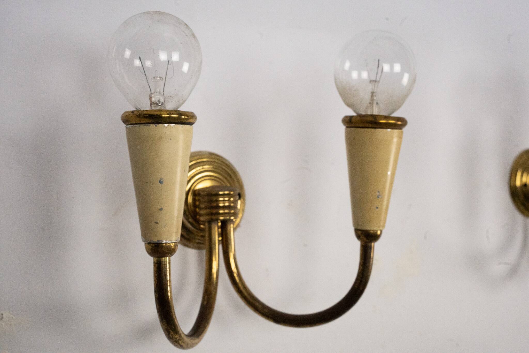Set of four Mid-Century sconces in lacquer and brass. Italy 1950s