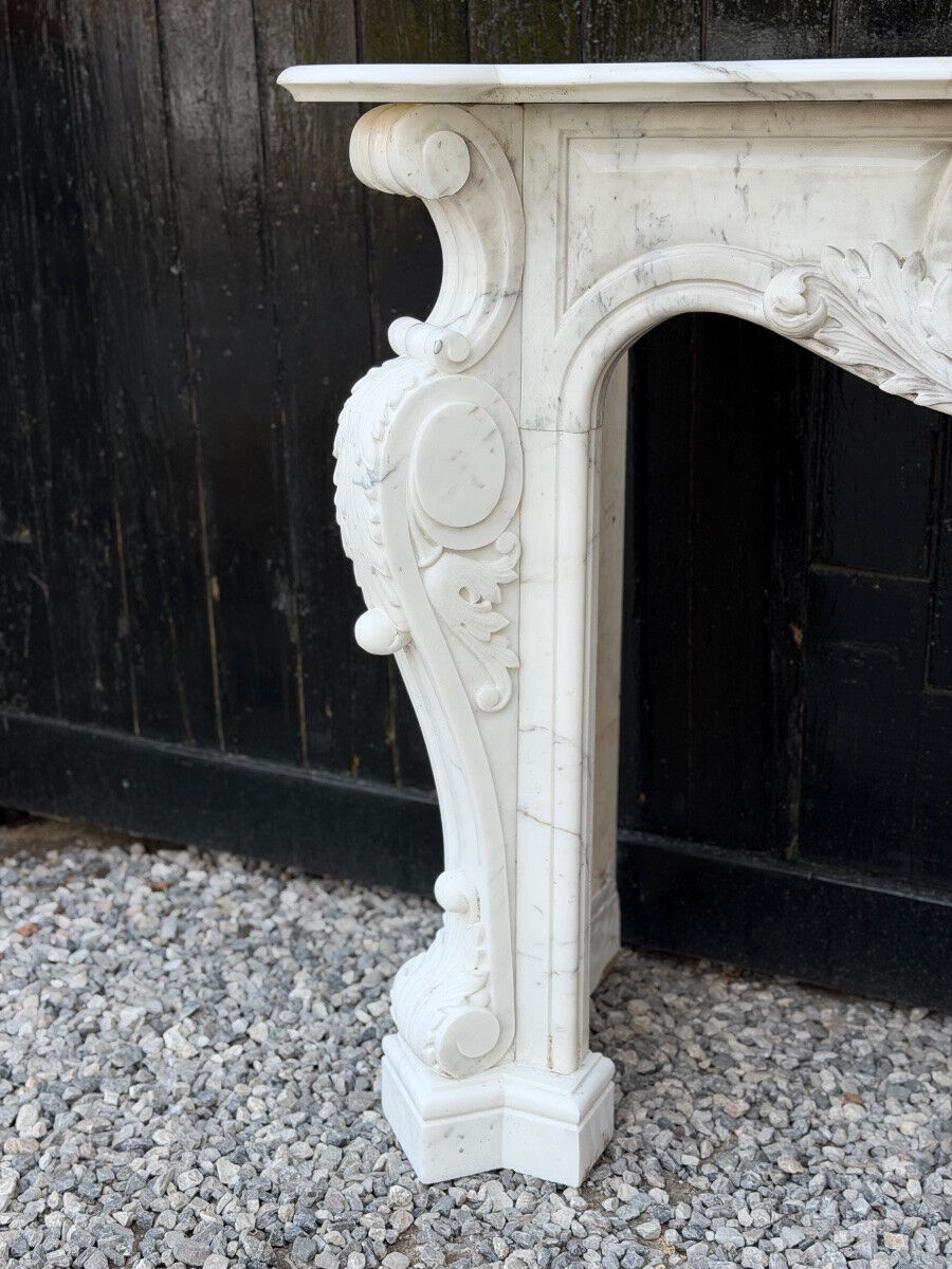 Louis XV style fireplace in Carrara marble, circa 1980.