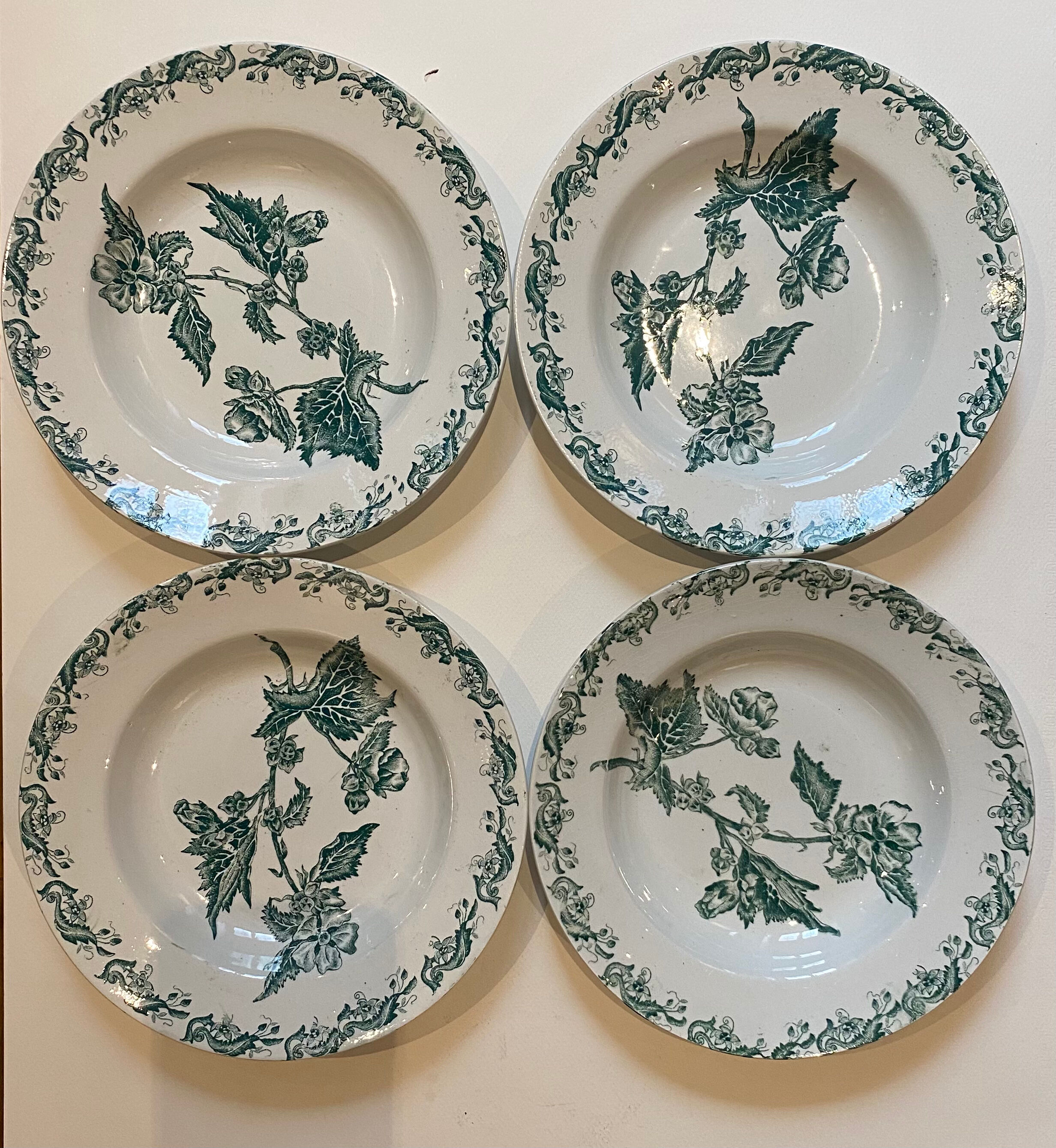 Set of 4 hollow plates, foliage decorations, Manufacture de St-Amand-les-Eaux