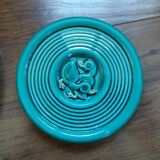 Emerald green coaster with duck pattern