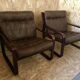 Pair of vintage armchairs in curved wood with suspended seat circa 1970-80.