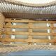 Rattan and wrought iron cradle