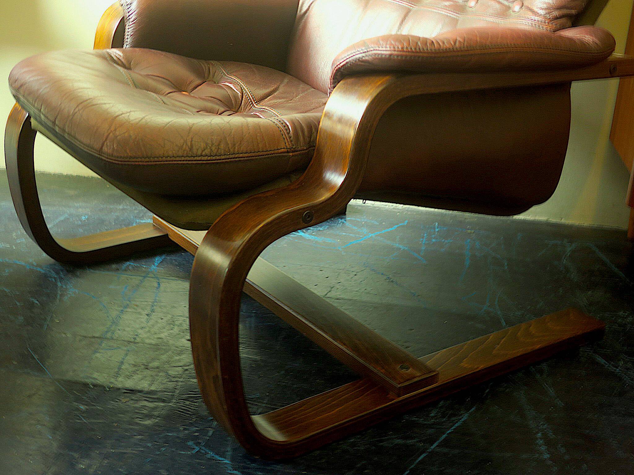 Mid century Scandinavian cantilever leather lounge chair and ottoman, 1960s