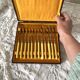Antique dessert forks in brass and bakelite